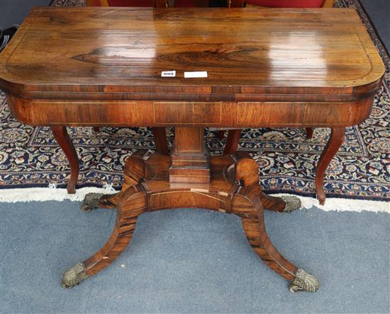 A Regency rosewood folding card table W.91cm